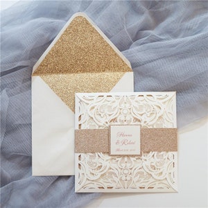 Ivory Laser Cut Wedding Invitation: Gold Shimmer Pocket Design