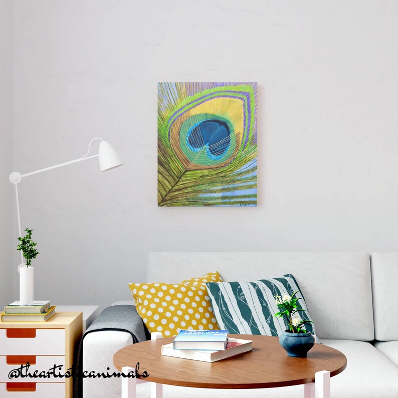 Green and blue peackock feather painting on stretched canvas, ready to be hang, size 16x20 inches (40x50 cm), the picture shows how the artwork looks on a wall in a modern colorful living room over the sofa