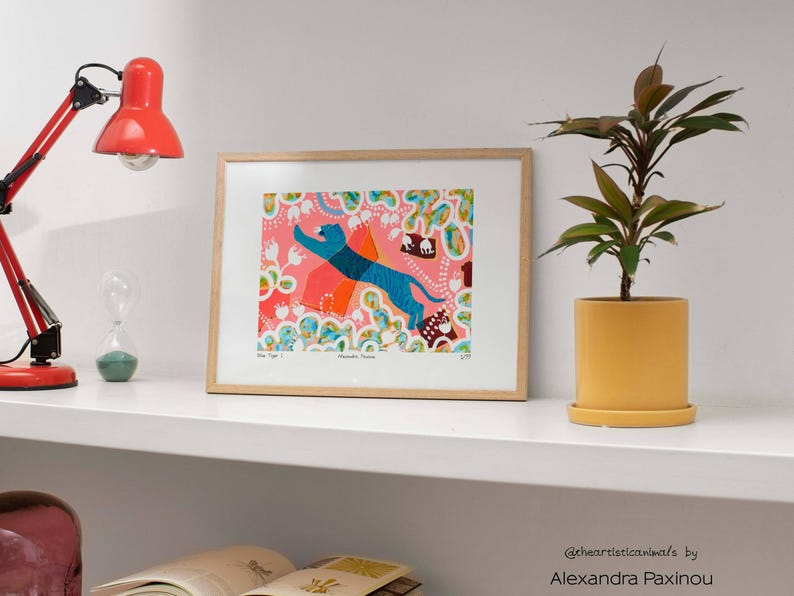 Limited edition art print of my original Blue Tiger I. acrylic painting. The Tiger is surrounded by minoan inspired abstract forms, shapes and flowers. unframed, how it looks framed on a shelf