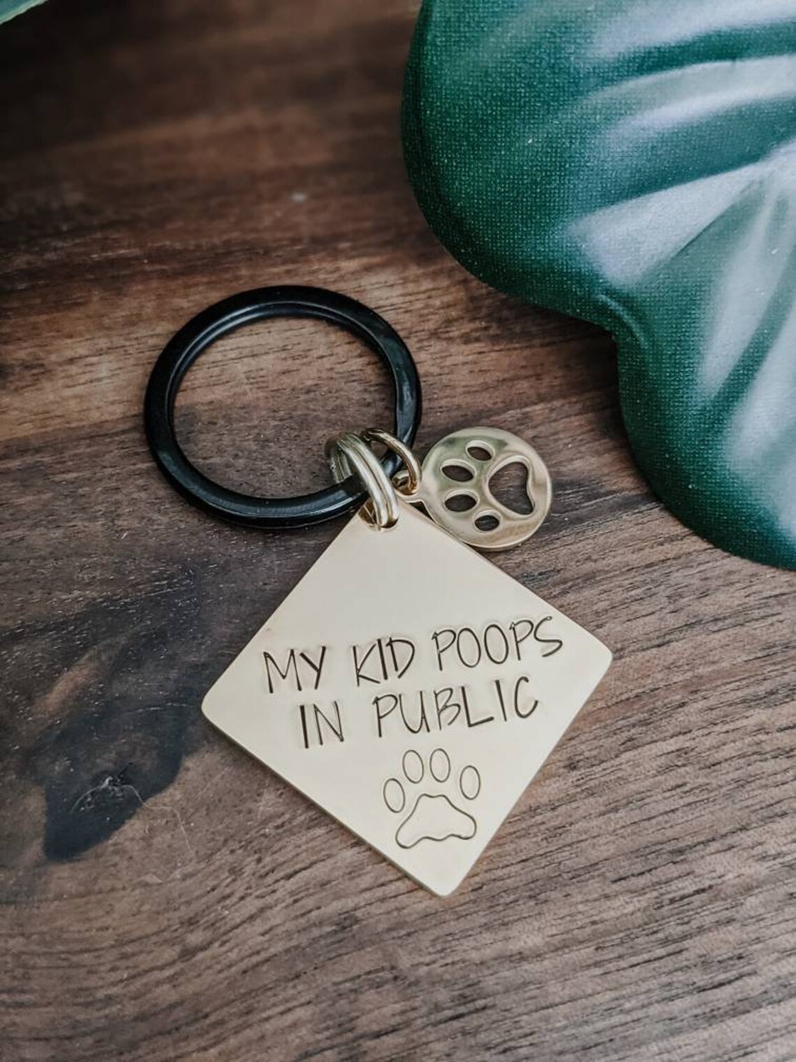 My Kid Poops In Public Keychain.