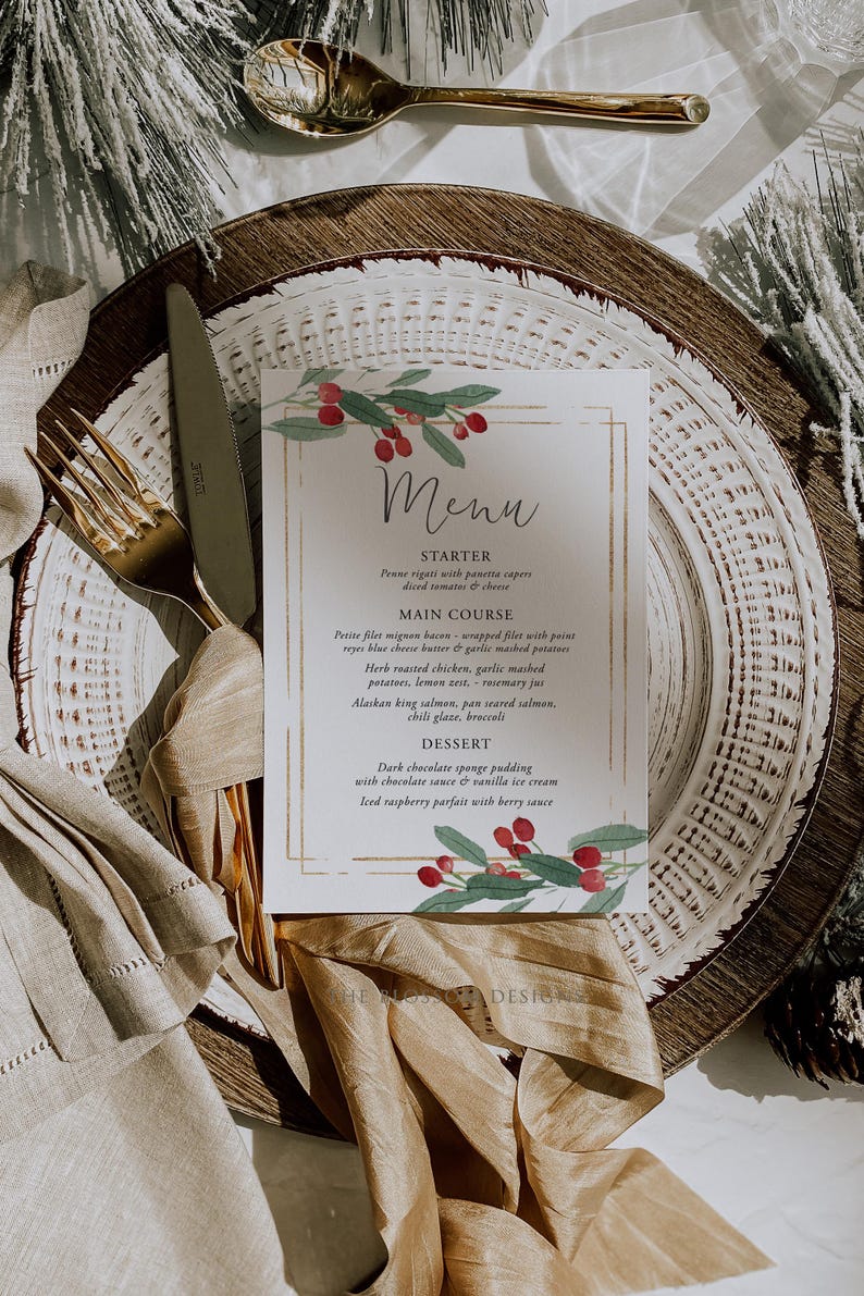 May include: A Christmas-themed menu with a gold border and watercolor illustrations of red berries and green leaves. The menu includes a starter, main course, and dessert. The text reads: "Menu, Starter, Penne rigati with pancetta capers, diced tomatoes & cheese, Main Course, Petite filet mignon bacon-wrapped filets with point reyes blue cheese butter & garlic mashed potatoes, Herb roasted chicken, garlic mashed potatoes, lemon zest, rosemary jus, Alaskan king salmon, pan seared salmon, chili glaze, broccoli, Dessert, Dark chocolate sponge pudding with chocolate sauce & vanilla ice cream, Iced raspberry parfait with berry sauce."