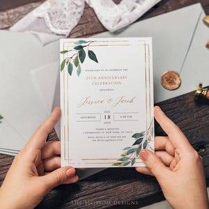 May include: A white invitation card with gold accents and botanical illustrations, held by hands. The card announces a 25th anniversary celebration, with the names Jessica & Jacob, date, time, and location. The Blossom Designs logo is at the bottom.