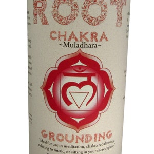 May include: Red candle with a white label that says "ROOT CHAKRA ~Muladhara~" and "GROUNDING" with a red symbol in the center. The label also says "Ideal for use in meditation, chakra rebalancing, relaxing to music, or sitting in your sacred space. Essential Oil Fragrance Blend: cedar, clove Crystal Journey Candles"