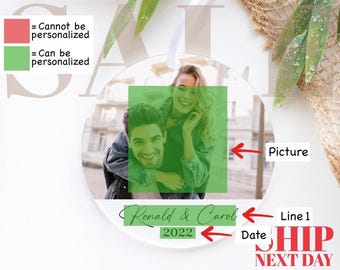 May include: A personalized Christmas ornament featuring a photo of a couple, the names "Ronald & Carol", and the year "2022".