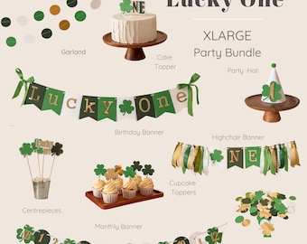 May include: A Lucky One themed party bundle with green and gold decorations. The bundle includes a cake topper, birthday banner, highchair banner, cupcake toppers, centerpieces, monthly banner, confetti, and a party hat.