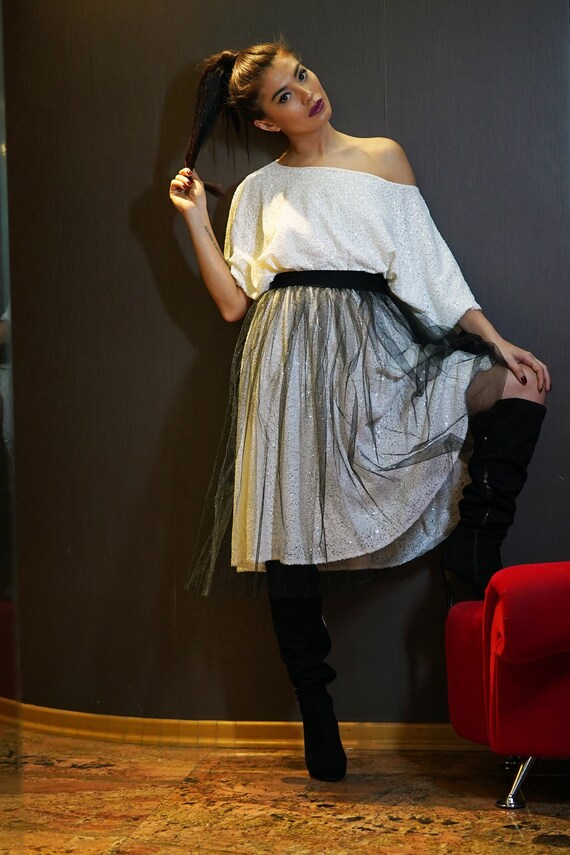 white sequin off the shoulder top