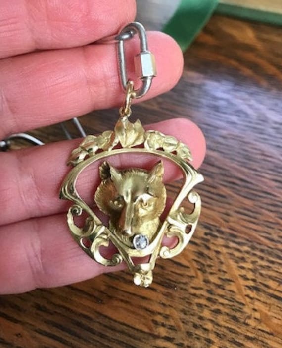 Antique 18k gold fox pendant with diamond