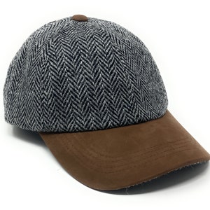 Harris Tweed golfpet voor dames of heren in zwart en grijs visgraat