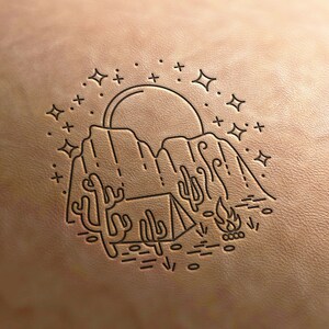 May include: Line art illustration of a desert landscape with a mountain, cacti, a tent, and a campfire. The scene is set under a full moon with stars in the sky.