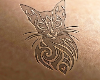 May include: A detailed, stylized illustration of a cat's face with intricate tribal patterns. The cat's face is outlined in black, and the patterns are in a light brown color.
