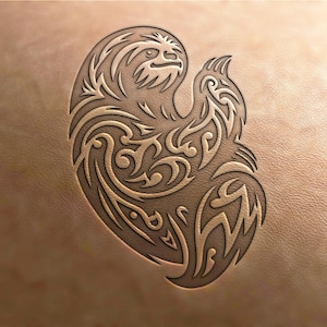 May include: A tribal-style sloth design carved into a piece of leather.