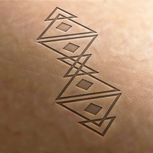 May include: A geometric design featuring overlapping triangles, forming a pattern of squares within the triangles. The design is etched into a light brown leather surface.