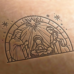 May include: A line drawing of the nativity scene with Mary, Joseph, and baby Jesus. The scene is set in a stable with a star above. The drawing is in a brown color and is on a tan background.