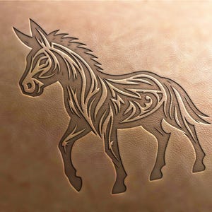 May include: A stylized line drawing of a donkey with intricate patterns on its body, carved into a light brown leather surface.