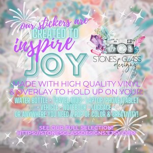 The image is an advertisement for Stones & Glass Designs, featuring a colorful background with fireworks and various items such as a camera, water bottle, travel mug, laptop, and more. The text highlights that Stones & Glass Designs offers high-quality vinyl overlays that can be used to hold up on any surface, and encourages viewers to see their full selection at their website.