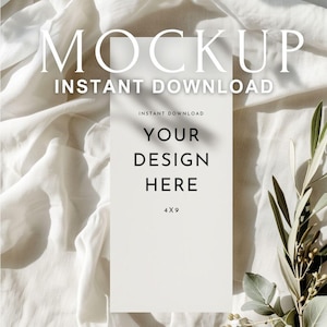 May include: A white rectangular card with the text "YOUR DESIGN HERE" and "4x9" is displayed on a white fabric background. The words "MOCKUP" and "INSTANT DOWNLOAD" are also visible. Green leaves and branches are in the background.