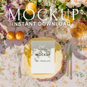 May include: A styled table setting with a floral tablecloth, featuring a yellow plate, a white card with "MOCKUP" text, silverware, and fresh fruit. The image includes the text "INSTANT DOWNLOAD".