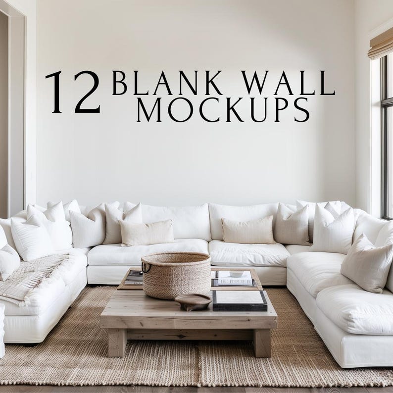 May include: A white sectional sofa with a variety of pillows in a living room setting. A wooden coffee table with a woven basket and books sits in front of the sofa. The wall behind the sofa is white and has the text "12 BLANK WALL MOCKUPS" written on it.