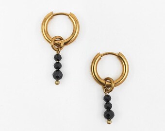Gold hoop earrings with black spinel charms, gemstone jewelry