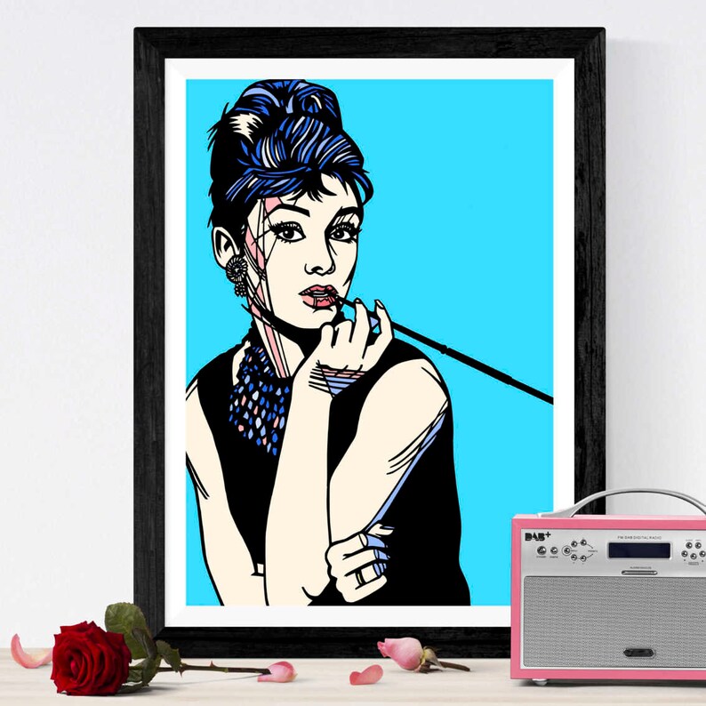 May include: A black and white pop art illustration of a woman with a cigarette in her hand. She is wearing a black dress and has a blue headband in her hair. The background is a bright blue.