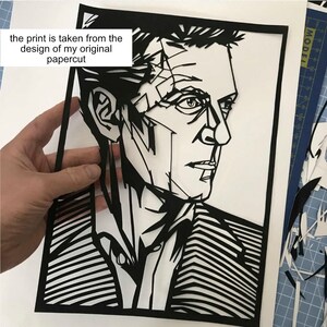 May include: Black and white papercut portrait of a man with a geometric design. The print is taken from the design of my original papercut.