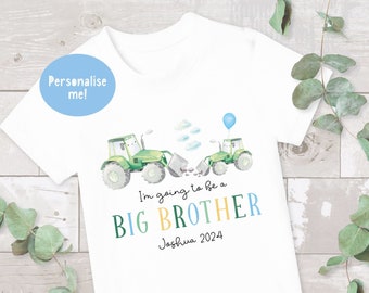 May include: White t-shirt with a green tractor and a blue balloon. The text "I'm going to be a BIG BROTHER Joshua 2024" is printed on the shirt.