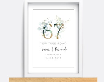 May include: A white framed print with a gold and green watercolor house number 67, the text "Yew Tree Road", "Fiona & David", "Our Home Since", and "14.10.2019".