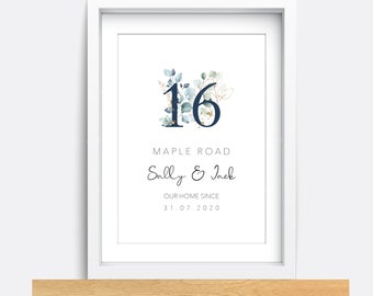 May include: A white framed print with a blue and gold floral design featuring the number 16. The text reads "Maple Road, Sally & Jack, Our Home Since 31.07.2020".