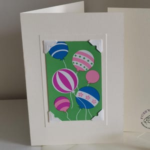 Handmade greetings/birthday card. Genuine vintage playing card, 1970s, birthday balloons, pink balloons blue balloons, baby celebration