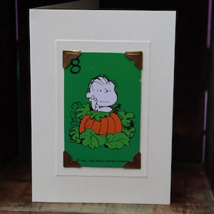 Handmade greetings/birthday card. Genuine vintage playing card, 1970s, Linus in the pumpkin patch. Snoopy & Charlie Brown&#39;s friend. Schulz.