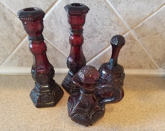 Avon Ruby Red Glass Cape Cod Collection; Sandwich pattern; Candlesticks; bell; pitcher