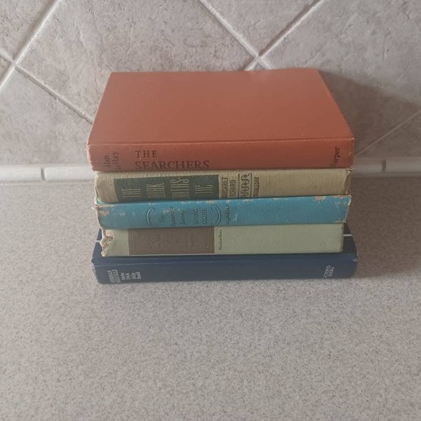 Vintage Hard Cover Books by Alan Le May, Margaret Echard, Herman Melville, Irving Stone, Agatha Young.