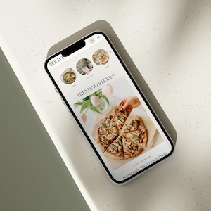Mobile responsive phone mockup of the Olive WordPress theme for food bloggers.