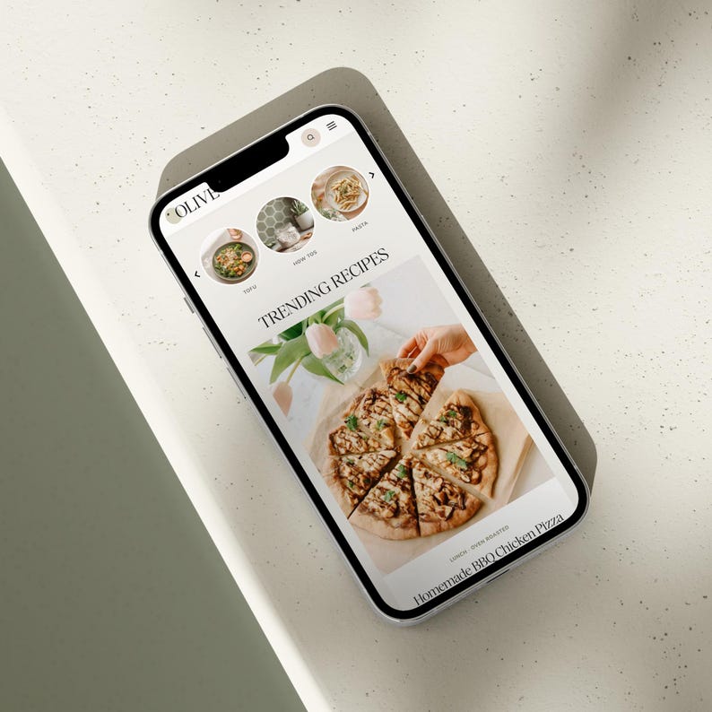 Mobile responsive phone mockup of the Olive WordPress theme for food bloggers.