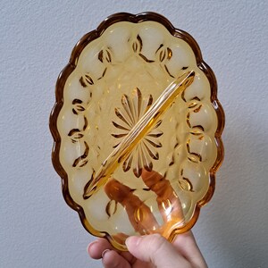 Vintage oval glass amber or honey gold relish dish by Anchor Hocking. Fairfield design, starburst, thumbprint  scalloped, trinket catch all