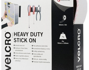 May include: A package of white VELCRO® brand heavy duty stick-on tape. The package shows a roll of tape with the text "50mm x 5m" and a weight limit of 7kg. The tape is 50mm wide and 100mm long.