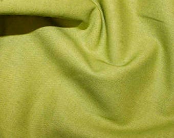 May include: A solid green fabric swatch. The fabric has a slightly textured surface.