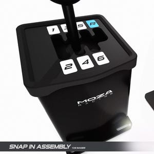 May include: Black shifter with a snap-in assembly and five different shift plate patterns. The shift plate patterns are black with blue numbers and letters. The text "ALL 5 SHIFT PATTERNS INCLUDED!" and "SHIFT PLATE X" are visible in the image.