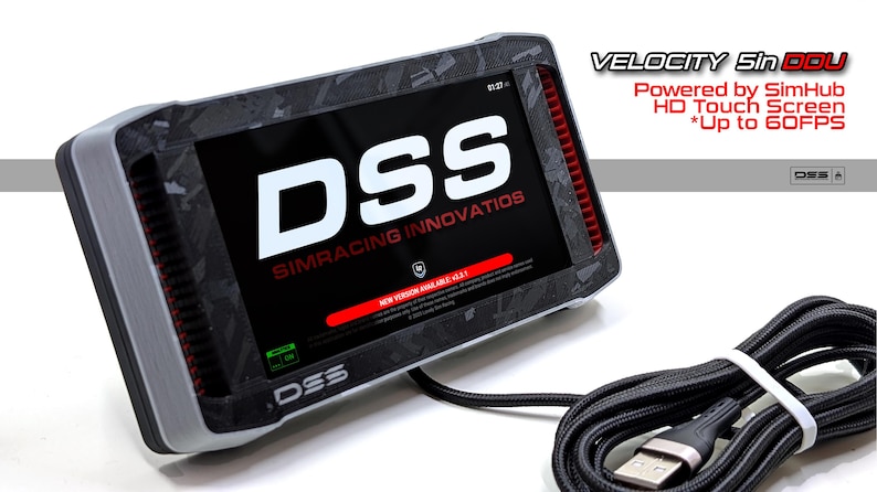 May include: A Velocity 5in DDU sim racing dashboard display with a black and gray patterned frame. The screen shows the text DSS SIMRACING INNOVATIOS and NEW VERSION AVAILABLE. Includes a black braided USB cable with a standard connector.