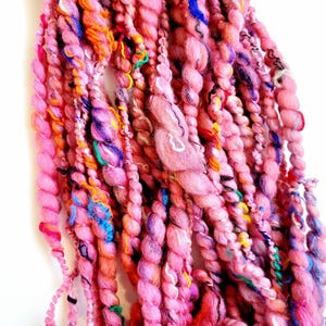 Coral Pink Art Yarn: Hand Spun Thick and Thin Coils