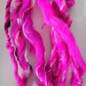 Hot Pink Art Yarn: Thick and Thin Hand Spun Fiber single ply