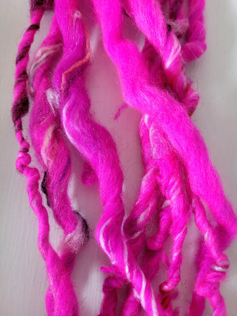 Hot Pink Art Yarn: Thick and Thin Hand Spun Fiber single ply
