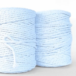 May include: Two spools of light blue cotton rope.