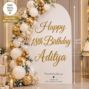 May include: A white arched vinyl decal featuring gold text that reads Happy 18th Birthday Aditya. The decal is displayed on a 183 cm tall arched board decorated with a cluster of white and gold balloons and small white flowers. Vinyl decal only.