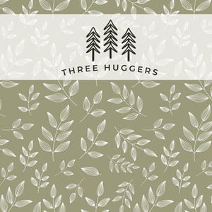 May include: A repeating pattern of white leaves on a muted green background. The design includes a banner with three stylized black trees and the text "THREE HUGGERS". The overall aesthetic is nature-inspired.
