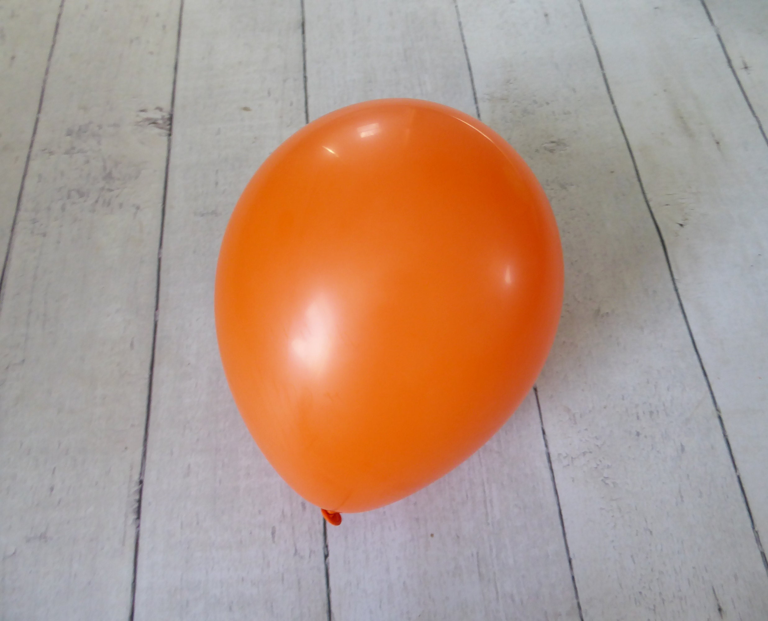 Ballon Orange fluo X100pcs