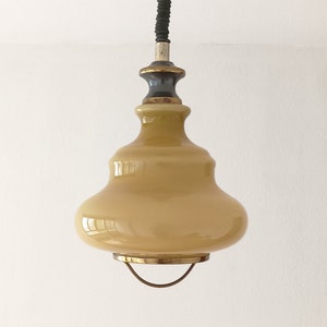 Mid century yellow/mustard opaline pendant light from the 60s, height adjustable up and down light