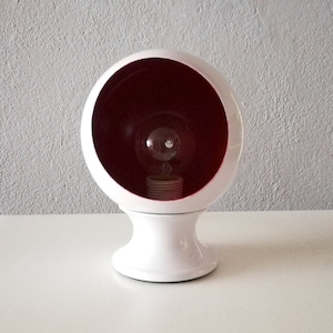 Pop Era white and purple Space Age metal eyeball or egg-shaped table or desk lamp circa 1980 Small Mcm table or shelf lamp