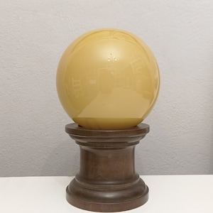 Mid century nordic vintage table lamp with wooden base and yellow opaline globe from the 1950s