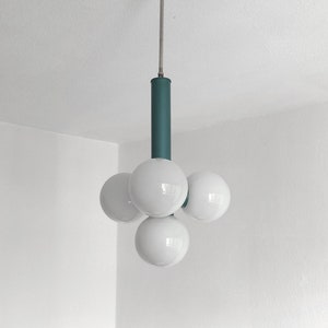 Atomic blue atomic sputnik pendant light with four opaline globes Space age circa 1970 Vintage hanging light with white glass shades